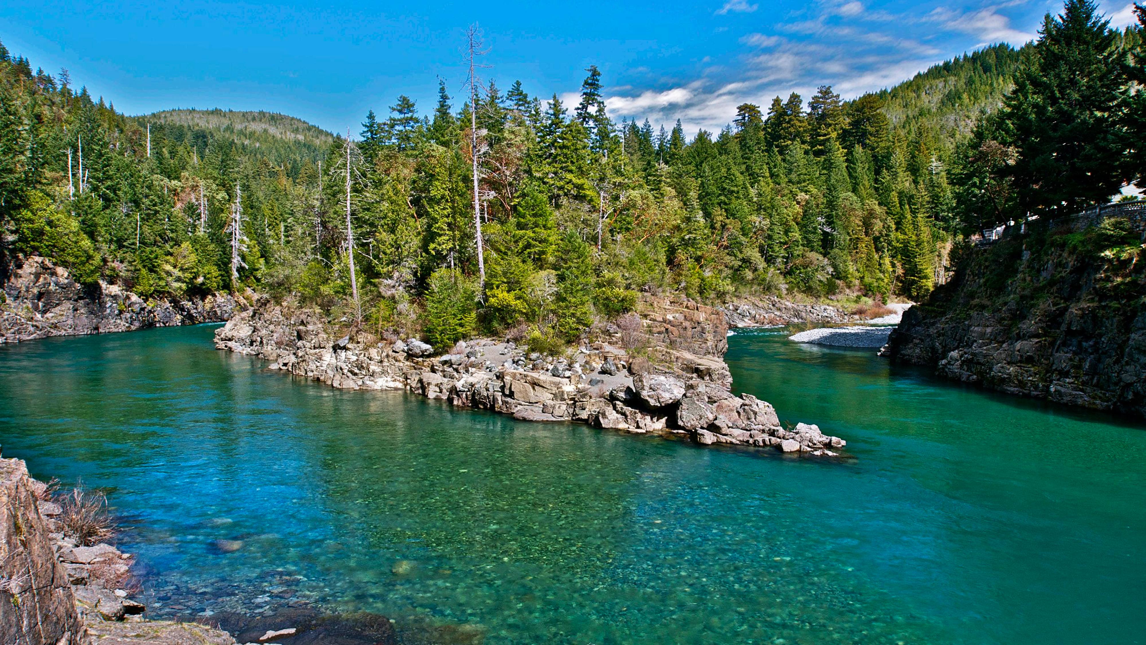 Crystal clear Smith River flowing through Northern California forest